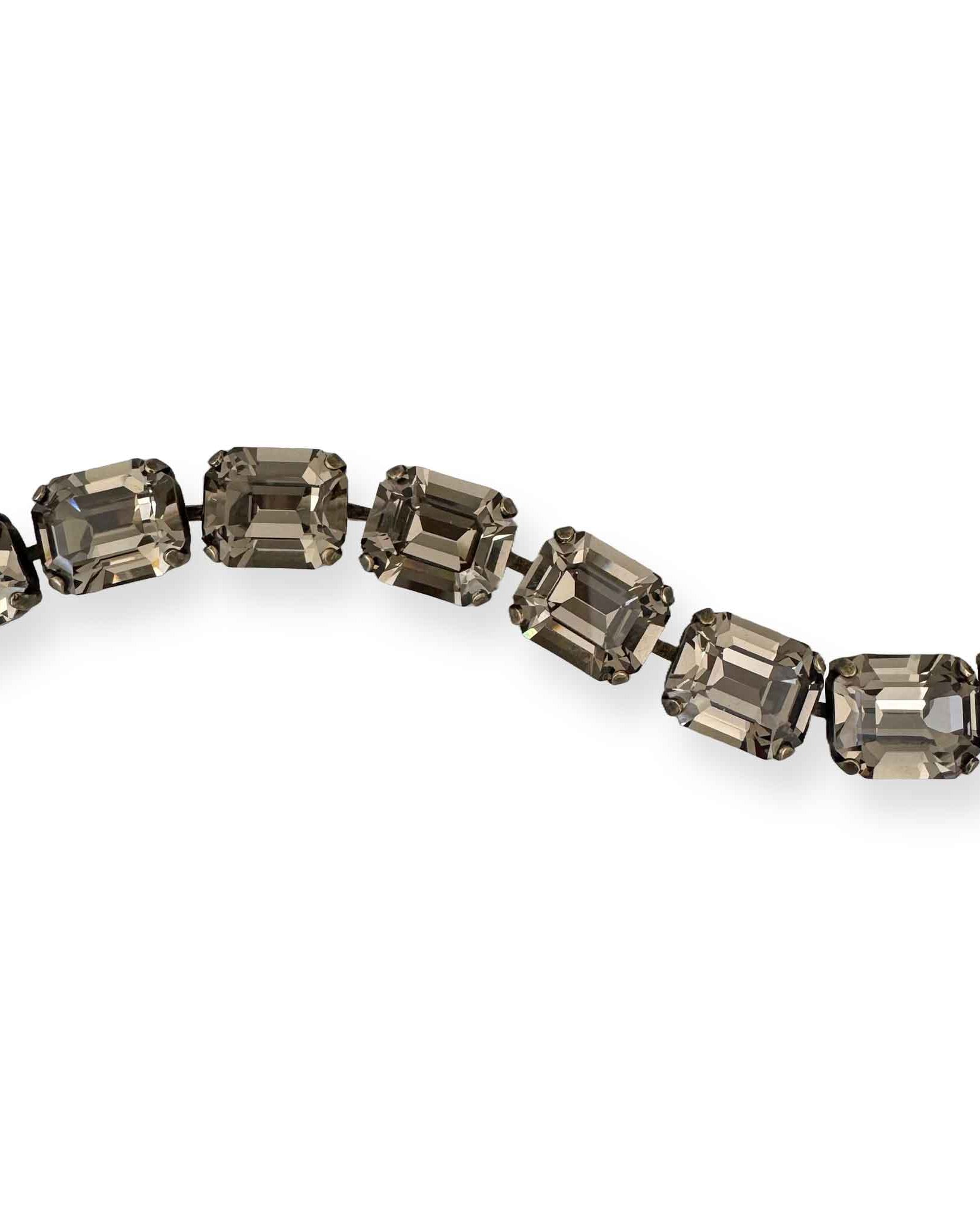 Close up of black diamond crystals in bracelet.