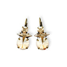 Unique champagne drop earrings shown in antique brass.