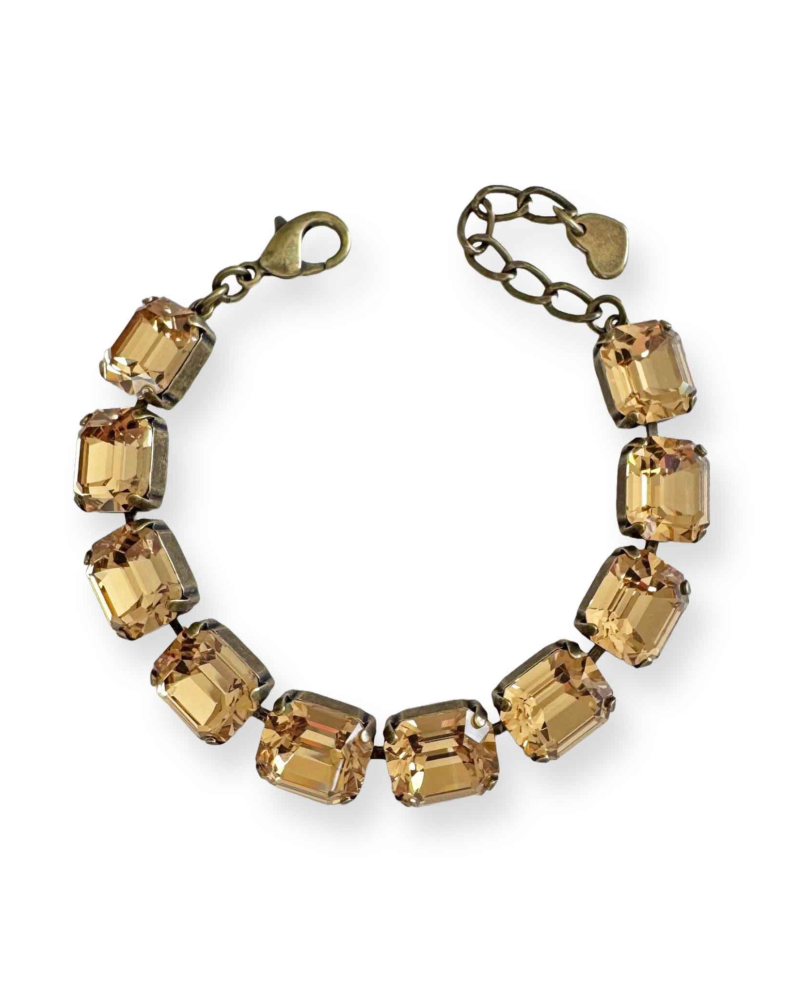 Emerald-cut crystal bracelet in warm, light Colorado topaz color set in antique brass. Adjustable.