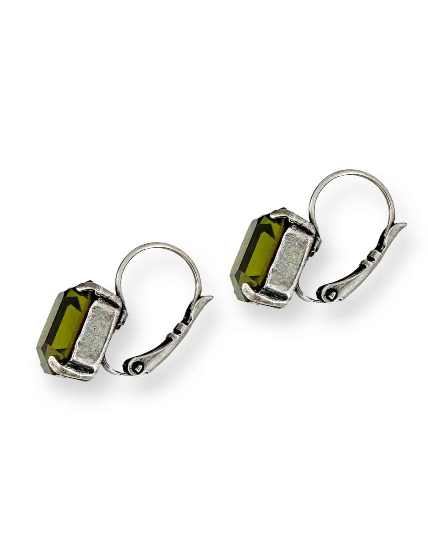 Side view of silver and olive green leverback emerald-cut earrings.