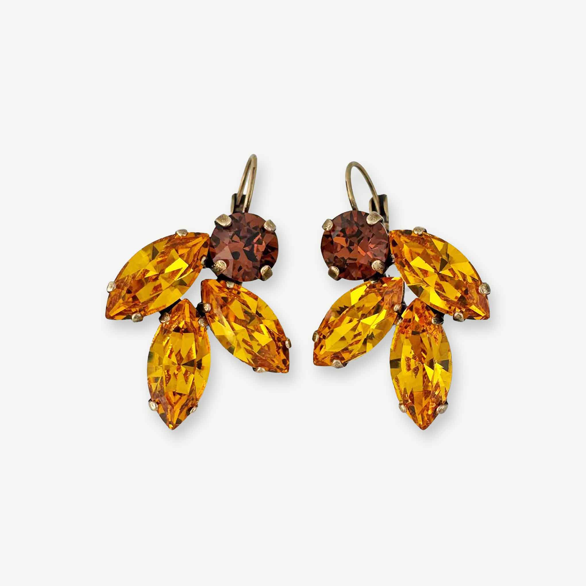 Golden topaz and brown topaz colored crystal drop earrings in a leaf motif.
