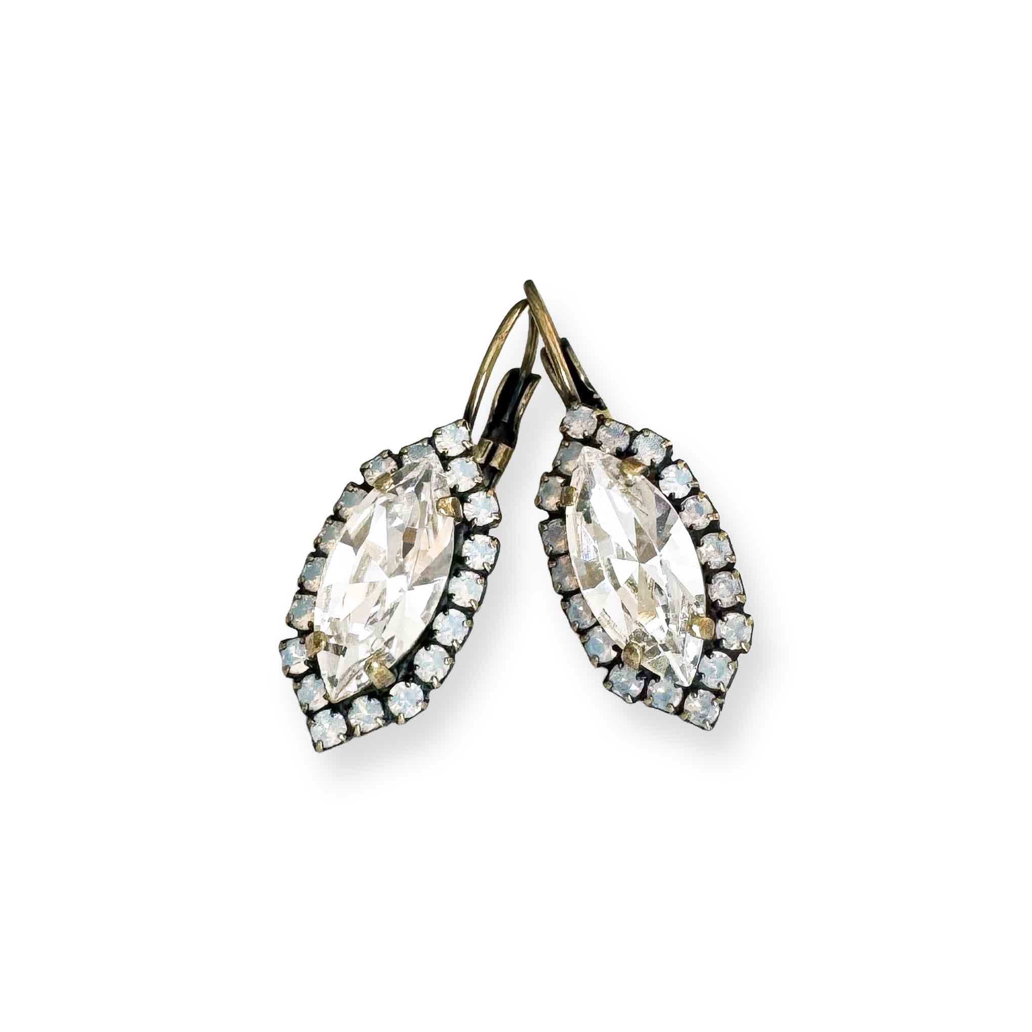 Marquise cut halo earrings with white opal and clear crystal. Shown in antique brass finish.