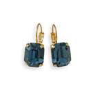 Deep blue crystal earrings shown with gold leverback hooks.