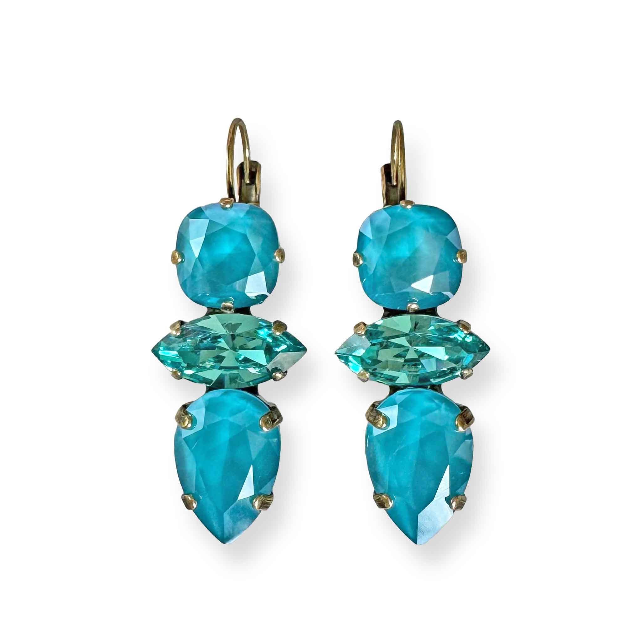 Aqua and turquoise crystal drop earrings in a antique brass setting, inspired by Caribbean blue waters. Lightweight and handmade, perfect for summer or vacation wear.