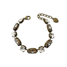 Black diamond and clear crystals are set in an adjustable brass statement bracelet. Vintage crystals by Swarovski.