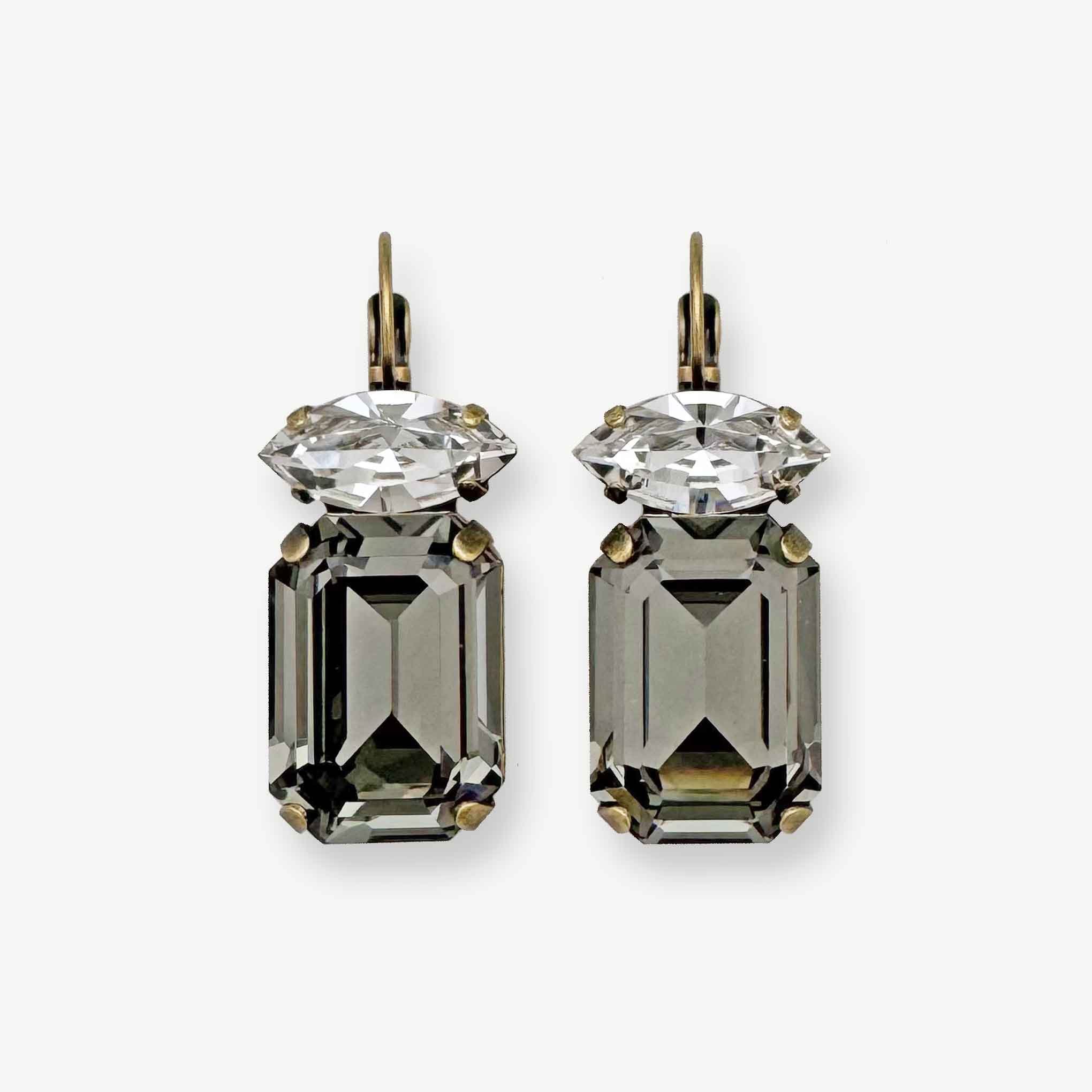 Clear and black diamond (grayish) crystal drop statement earrings. Modern and geometric in antique brass.