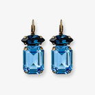 Emerald and marquise cut blue crystal drop earrings shown in antique brass.