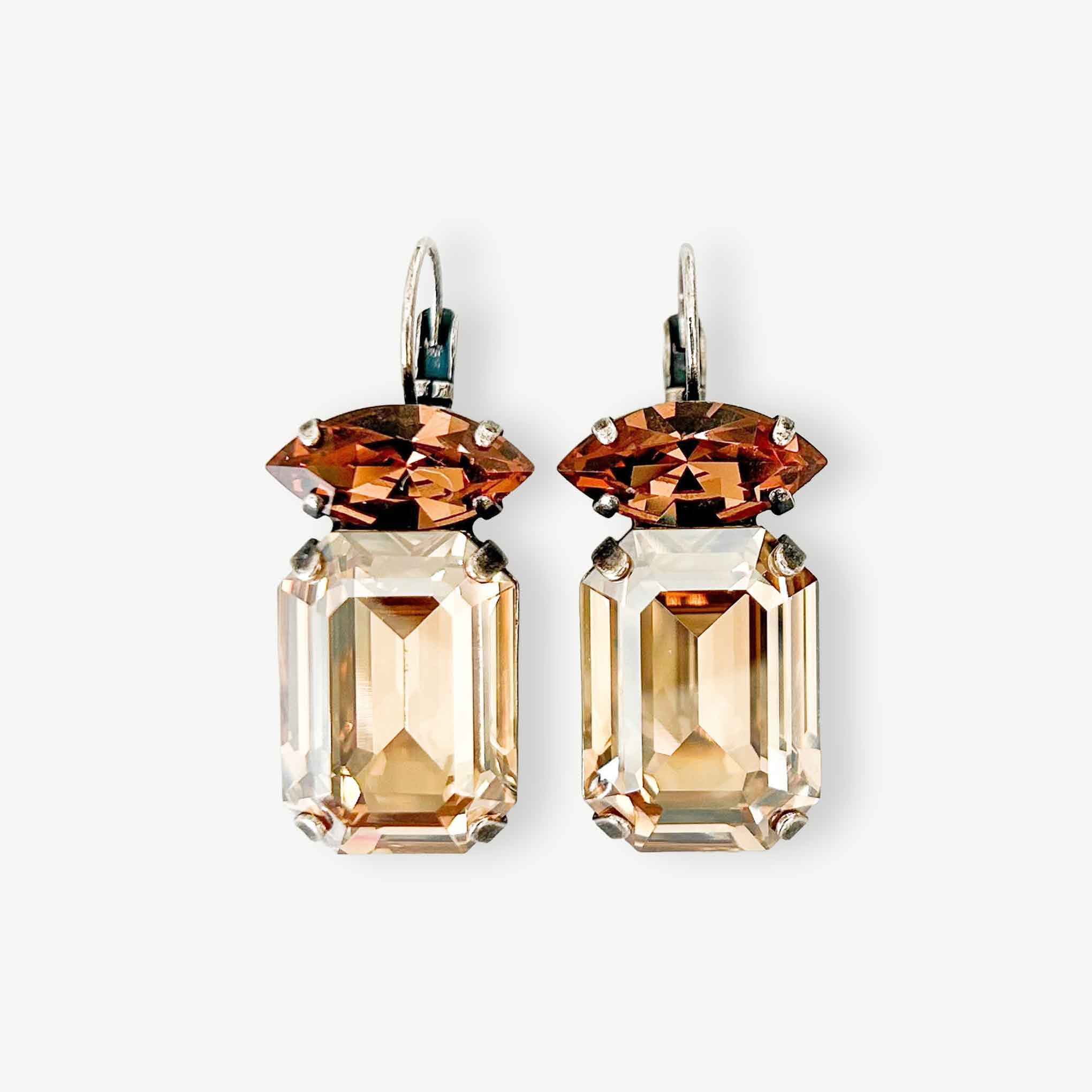 Brown and champagne color emerald cut crystal statement earrings shown in silver.