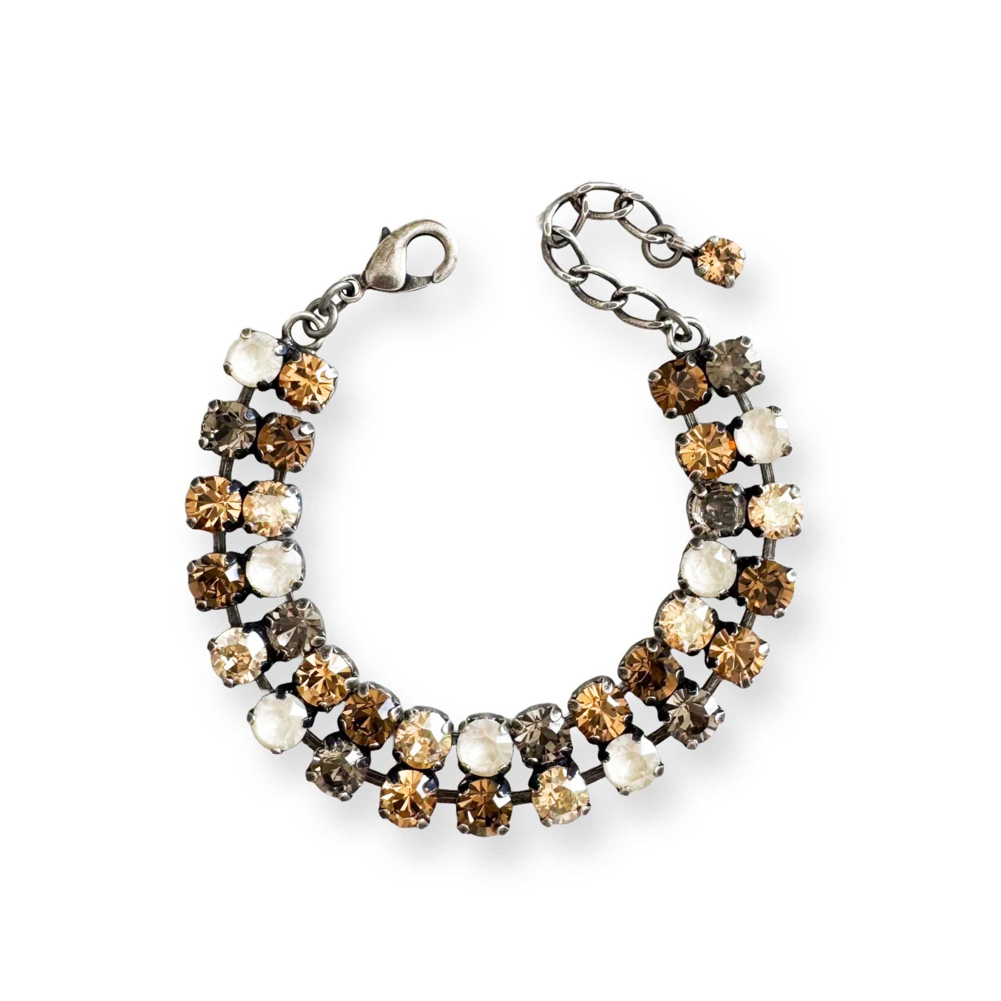 Crystal bracelet in a multi-color mix of browns and neutrals with antique silver.