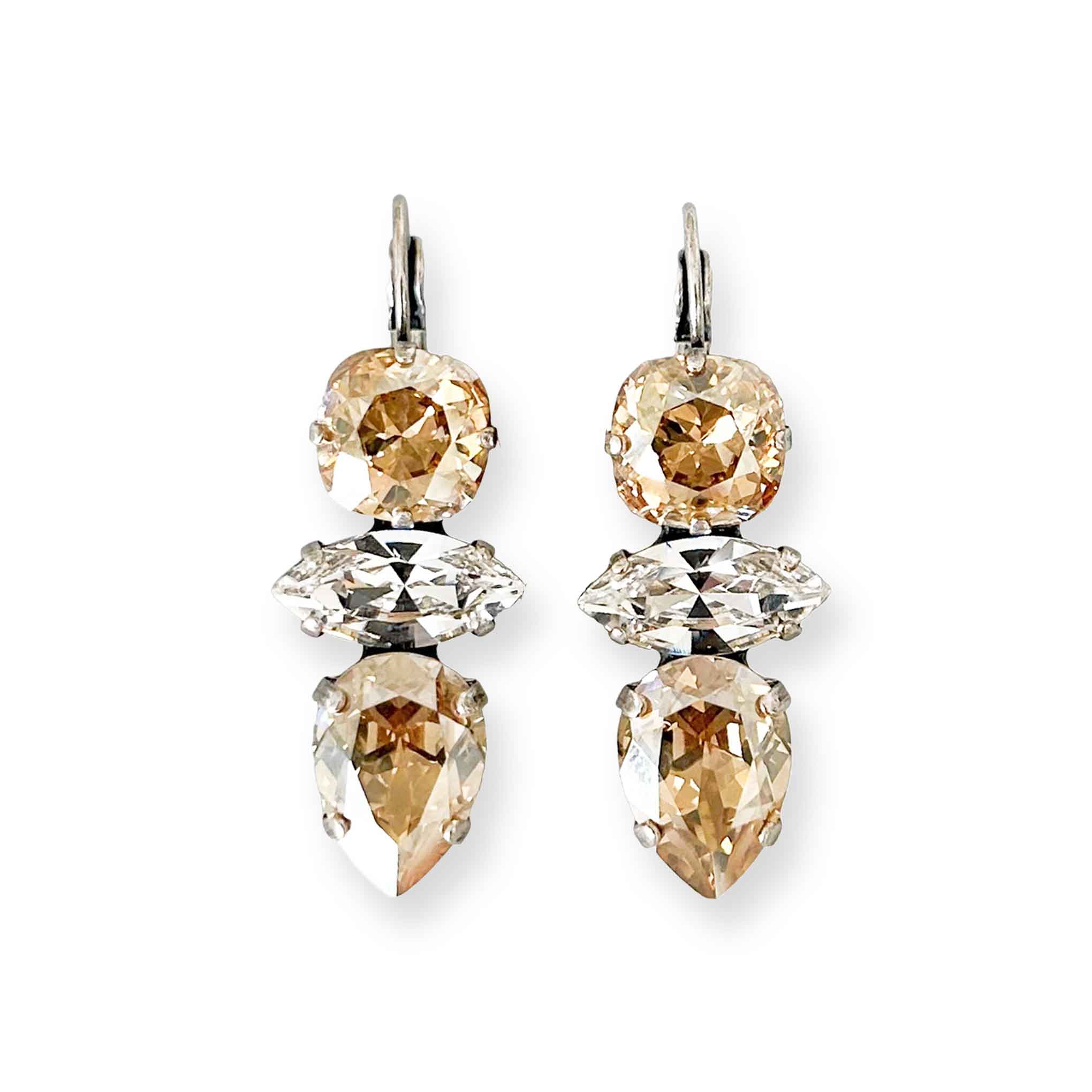 Gold jewel earrings shown in silver finish.