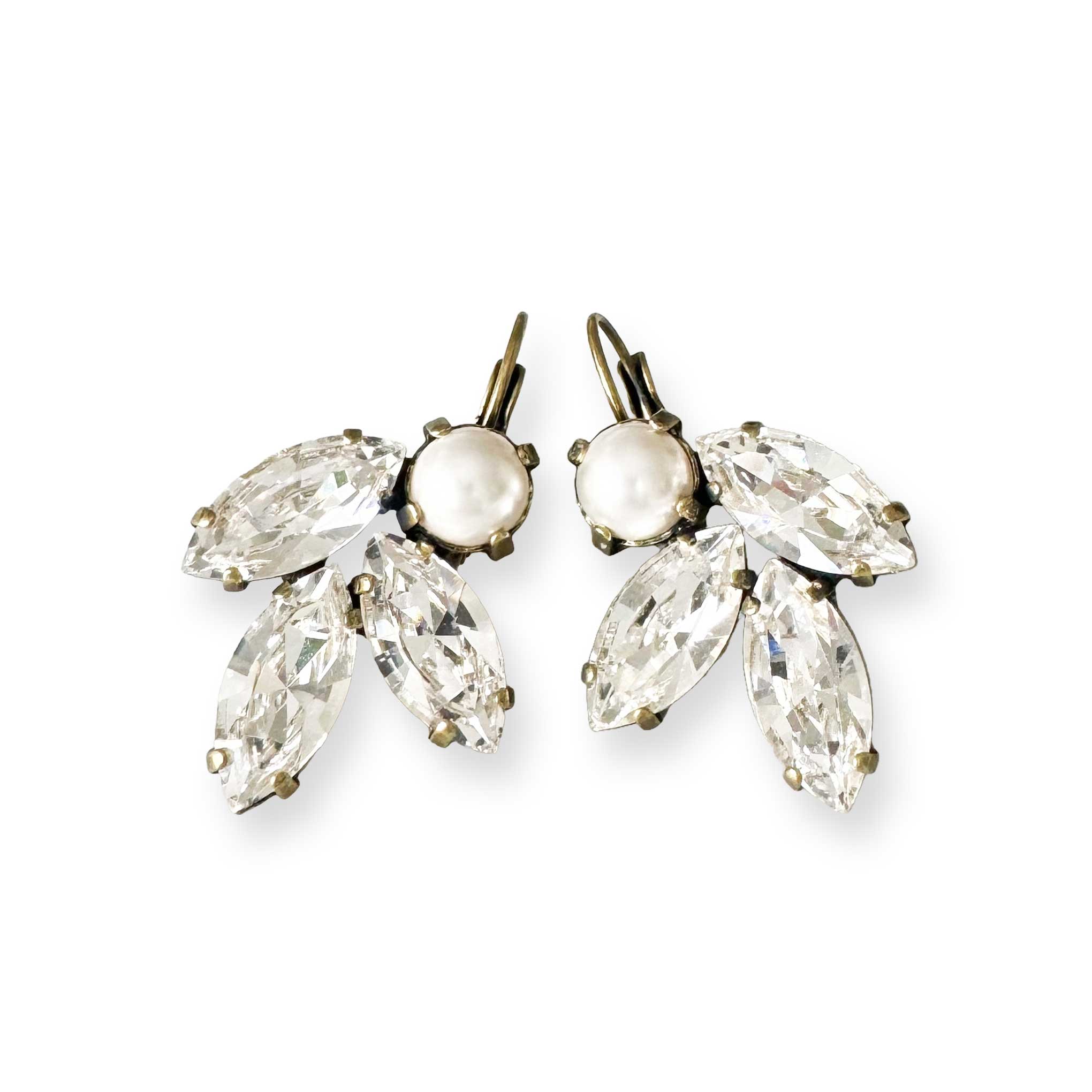 Pearl and crystal earrings with marquise cut leaf motif. Shown in antique brass and available in silver.