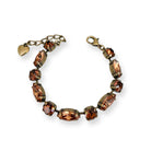 Brown topaz crystal rhinestone bracelet in antique brass with heart charm.