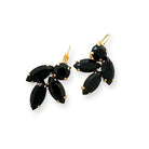 Cut crystal jet black earrings with a leaf motif in gold.