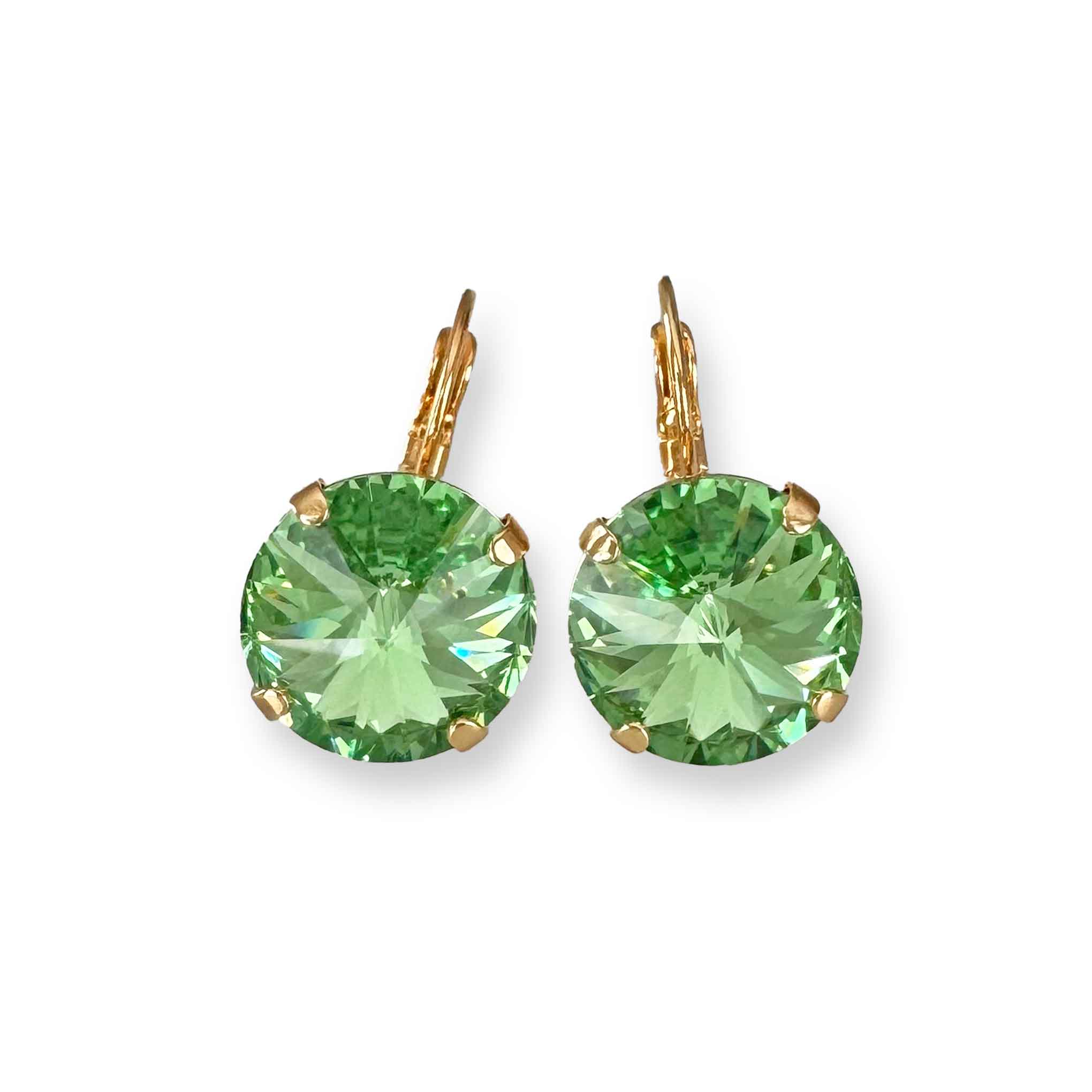 Light green crystal drop earrings with gold leverbacks.