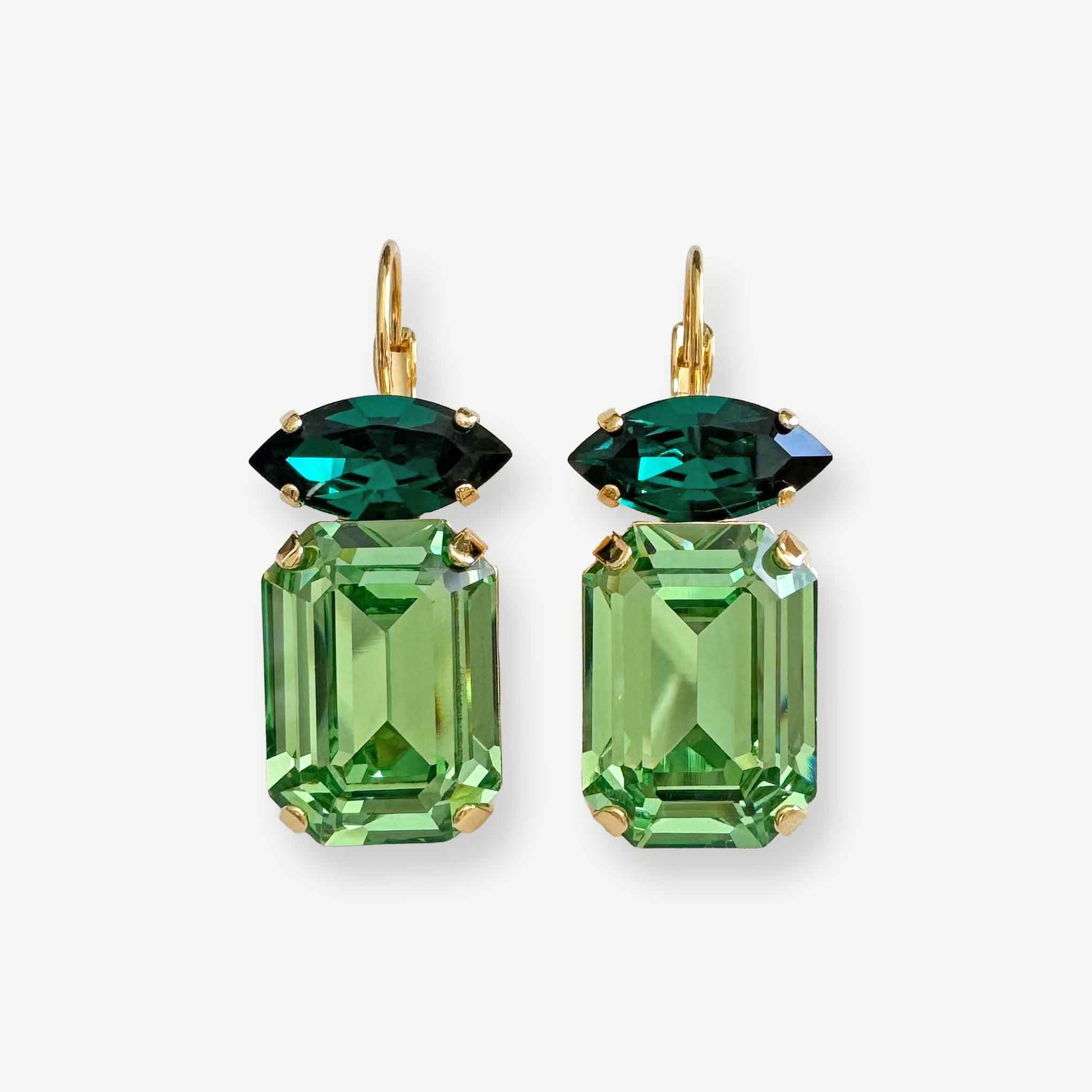 Dark and light green crystal drop earrings with emerald and marquise cut crystals shown in antique brass.