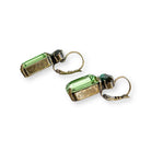 Another side view of dark and light green crystal drop earrings with emerald and marquise cut crystals shown in antique brass.