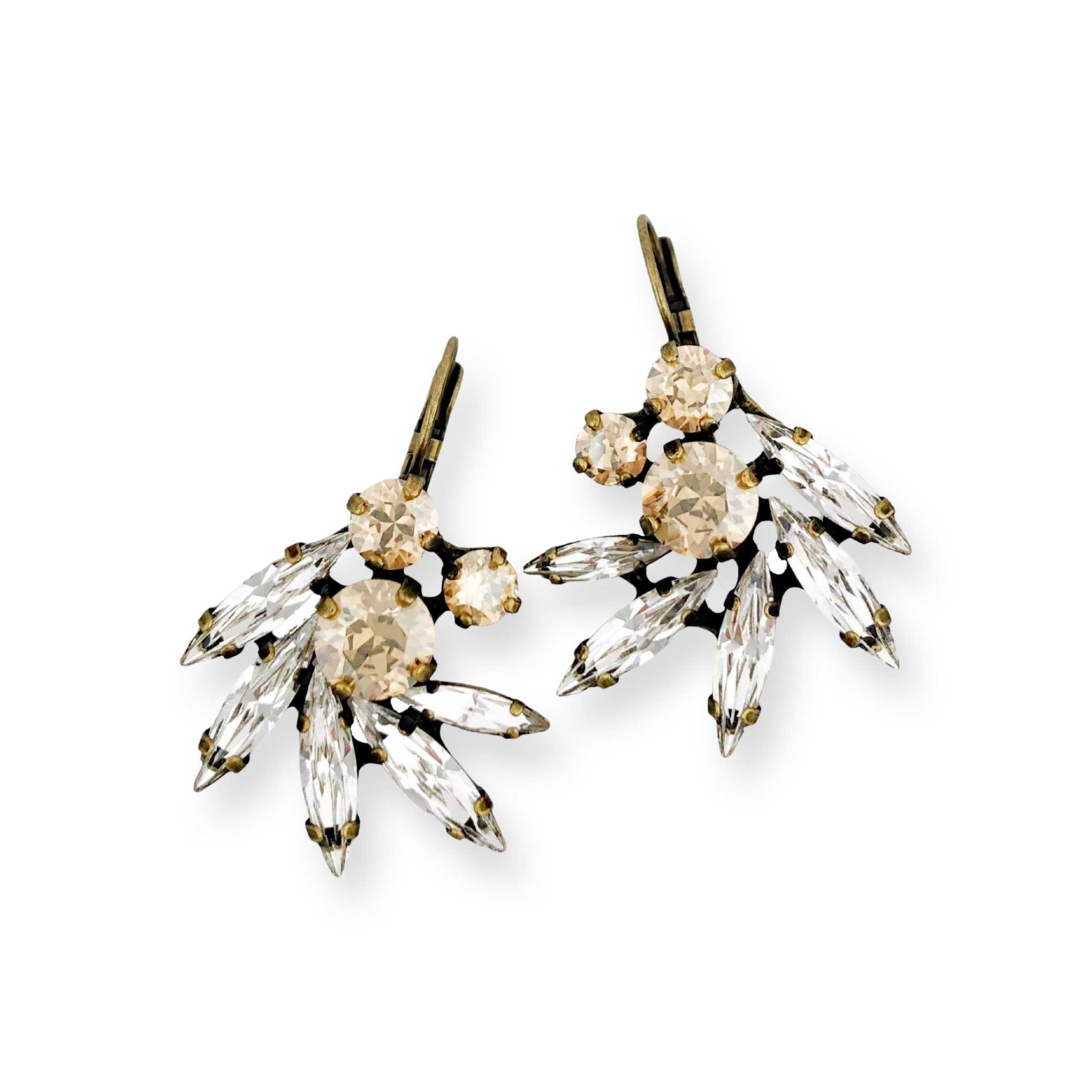 Crystal rhinestone statement earrings with clear and golden shadow Swarovski crystal. Shown in antique brass finish.