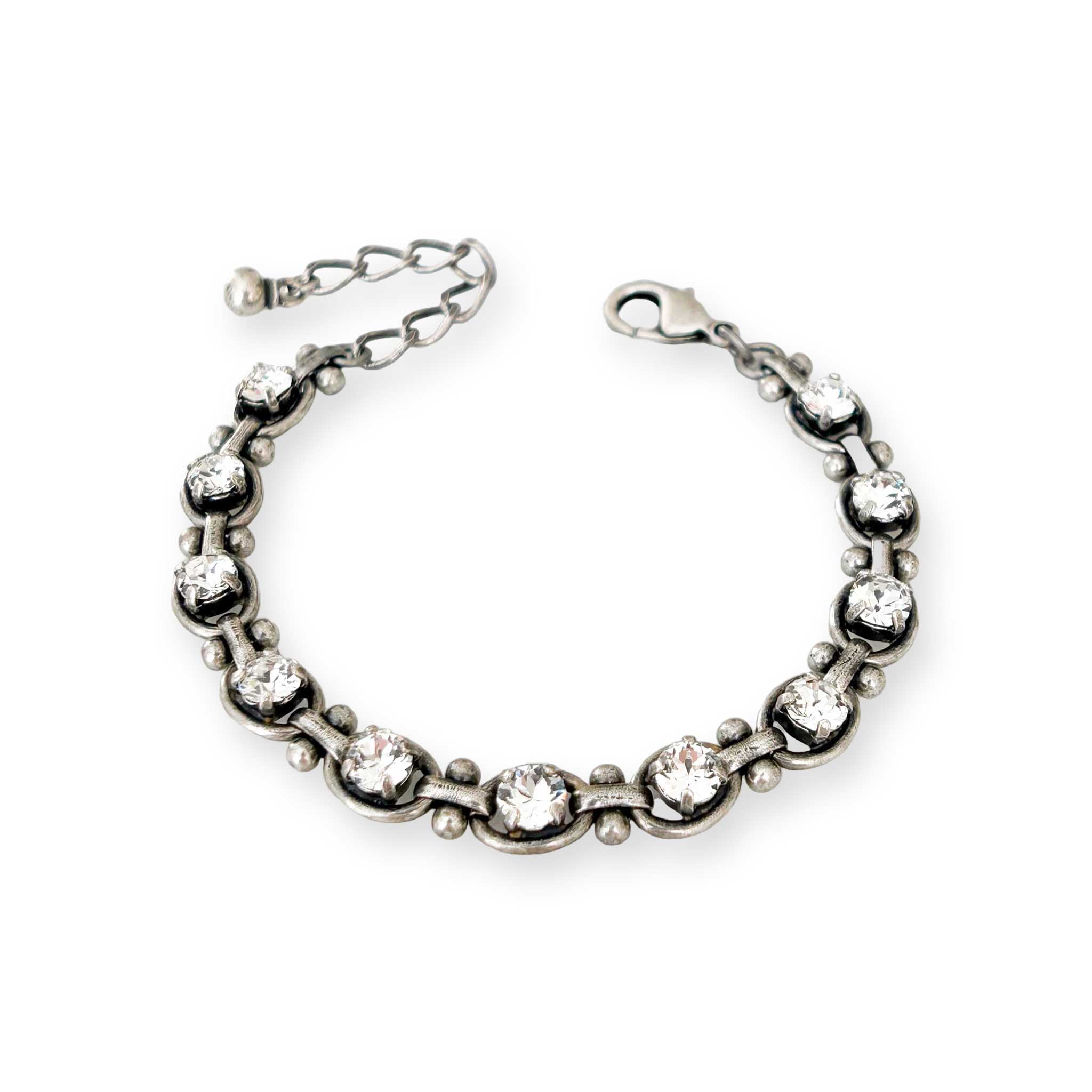 Edgy clear crystal bracelet set in antique silver link bracelet.