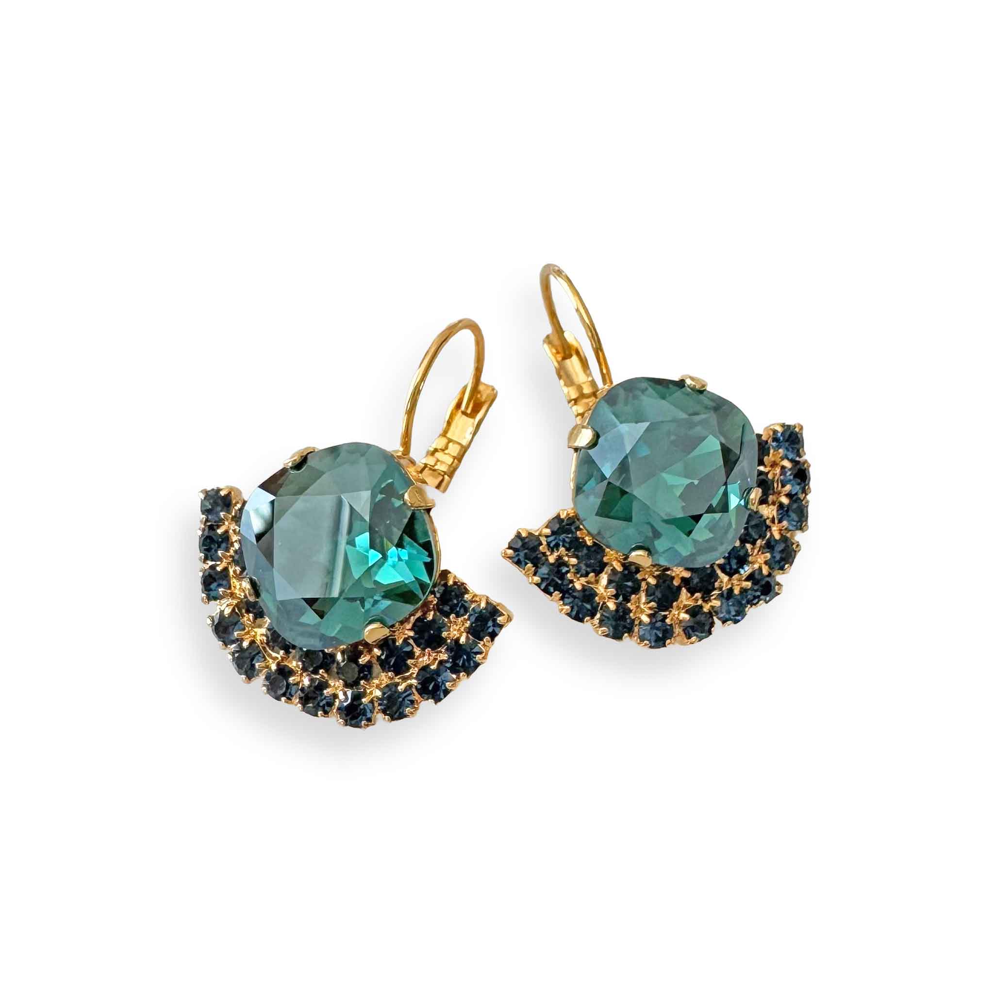 Cushion cut teal crystal earrings with navy accent crystals in gold.