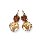 Brown and gold drop earrings with brown and yellow topaz color European cut crystal. Shown in antique brass.