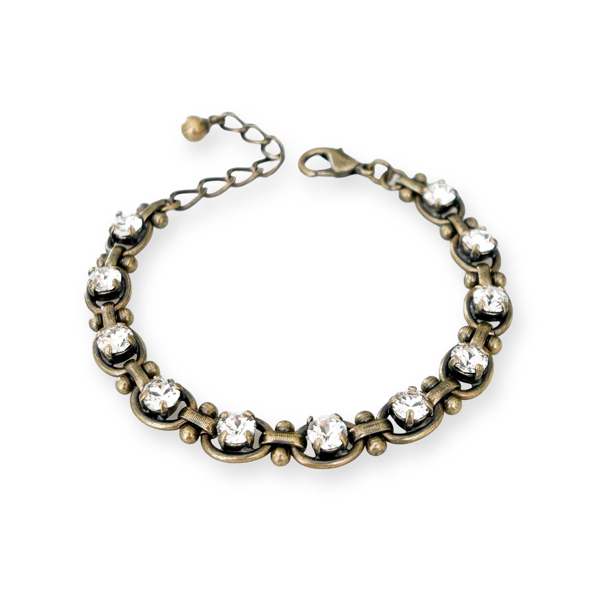Edgy brass and crystal tennis style bracelet.