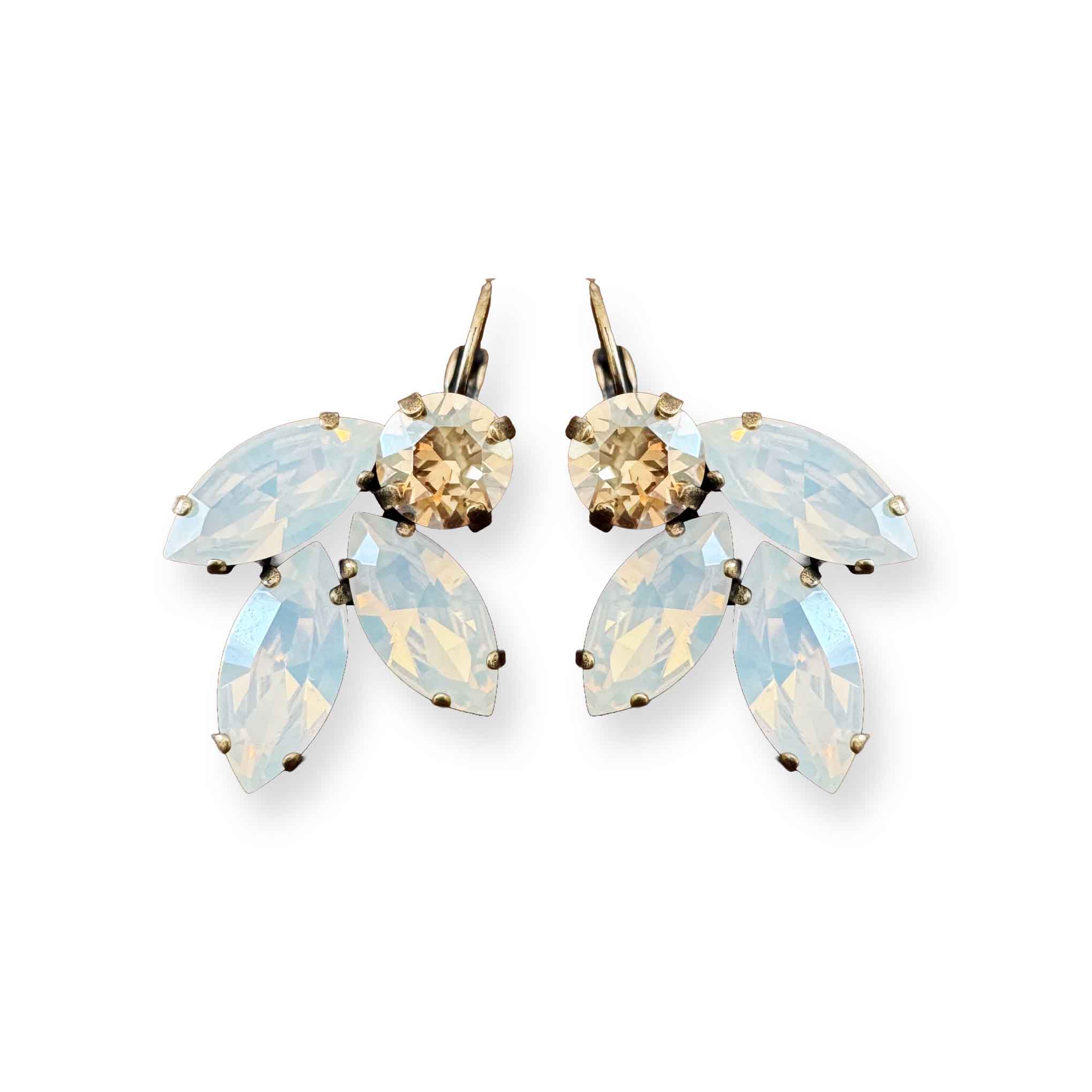 Pair of white opal and champagne crystal drop earrings in a leaf-like design with antique brass settings, displayed on a white background 