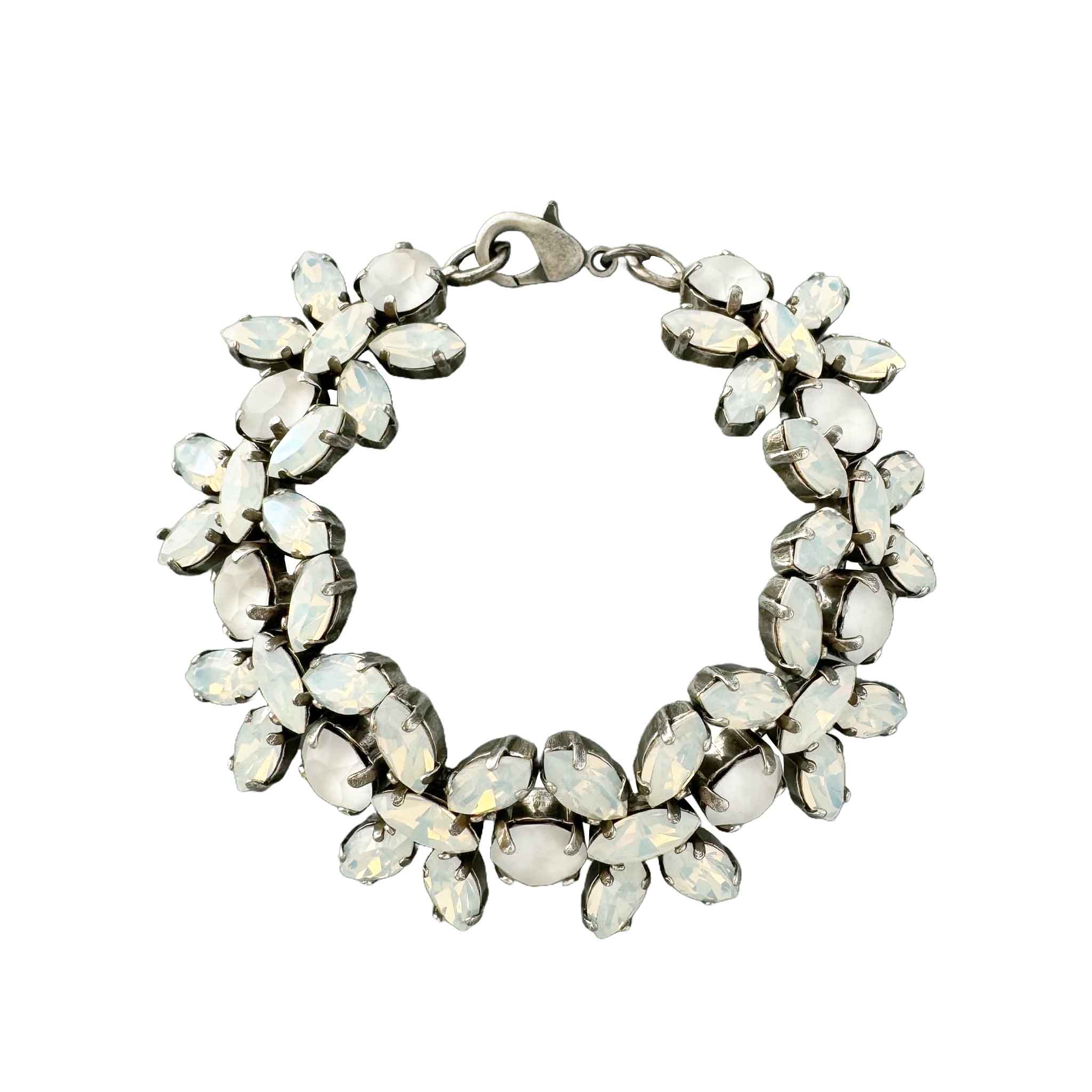 Leaf motif wedding bracelet made with white opal crystals.